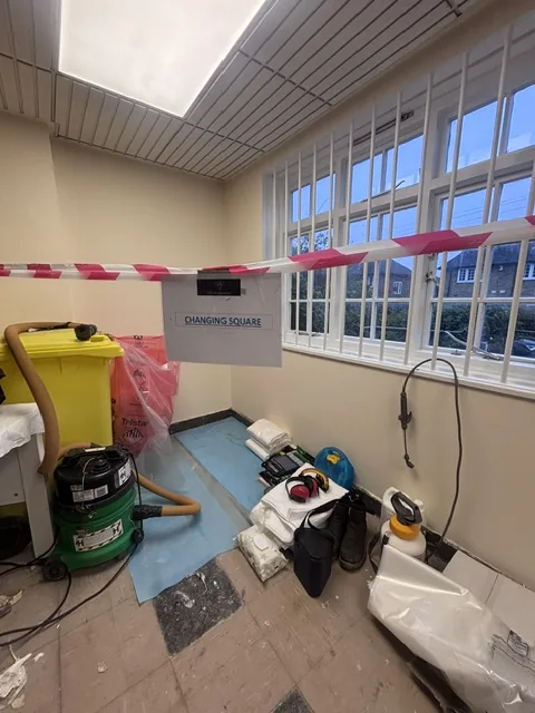 Asbestos floor tile and bitumen removal in Clapton